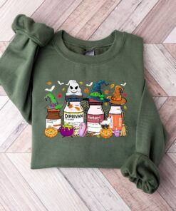 Happy Halloween ER Nurse Sweatshirt, Halloween ICU Nurse Shirt, Spooky Nurse, Nursing Halloween Sweatshirt, Pharmacology Shirt, Fall Nurse QFTZ3150802