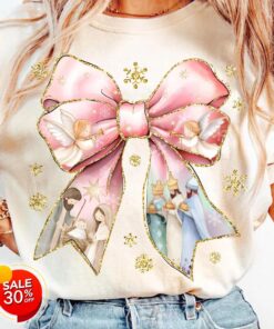 Jesus Christmas Coquette Bow Shirt, Pink Glitter Christian Christmas Sweatshirt, Nativity Scene Shirt, Baby Jesus Shirt, Bible Verse Gift QFHA4091105